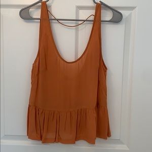 Lighter orange crop top